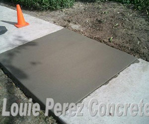 Wet Concrete on  New Sidewalk Construction