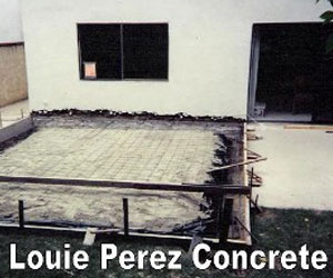 Concrete Road  Next to a House
