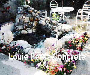 Stone Waterfall Surrounded by Flowers