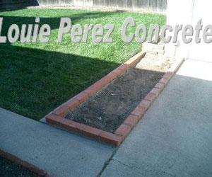 The Brick Bed  Next to a Lawn