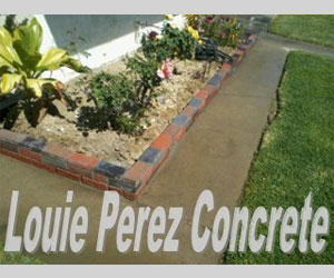 A White Tile Pathway In Front of  a House