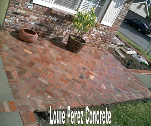 Raised Brick Bed In Front of a House