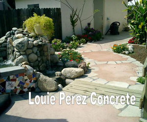 Stone Waterfall at a Corner in a Garden