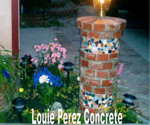 Colorful Flowers Next to Brick Pillar for Lamp